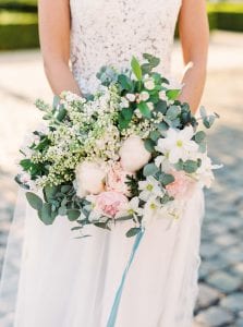 bridal bouquet with a dusty blue velvet ribbon for a velvet themed wedding