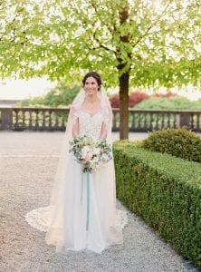 wedding castle in germany with a velvet theme in a dusty blue color palette, bridal bouquet with a ribbon