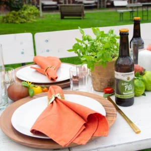 Atmospheric table decorations for an Italian outdoor party at sunset