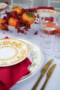 Hand-painted plate with red napkin.