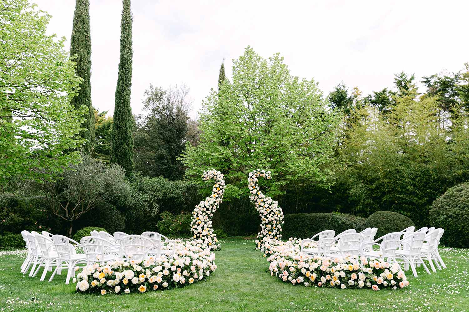 A crescent-shaped setting, embedded in lush greenery.